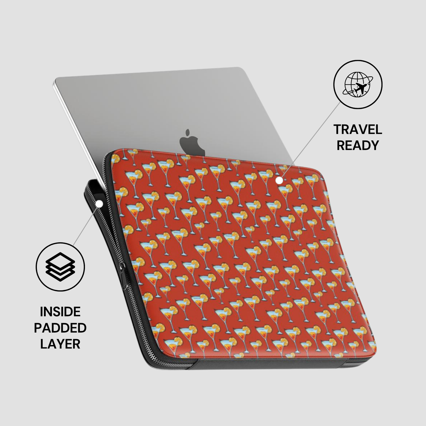 Laptop with a red case featuring a pattern of colorful drink glasses on a light gray background.