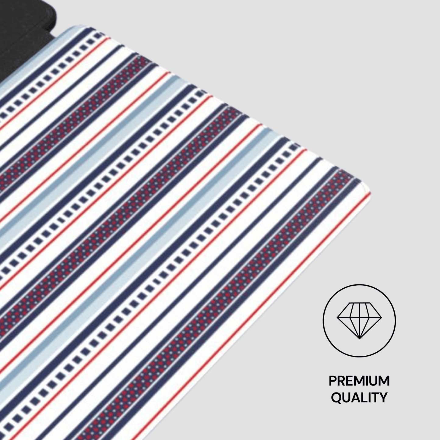 Striped fabric with red, blue, and white pattern on a gray background