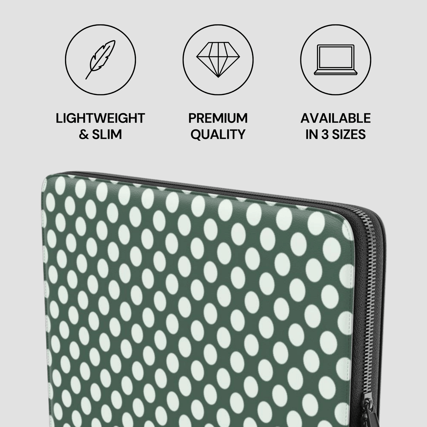 Polka dot laptop sleeve with product features on a light gray background