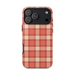 Phone case with a red and beige plaid pattern on a white background
