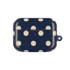 Navy blue case with beige polka dots on a white background