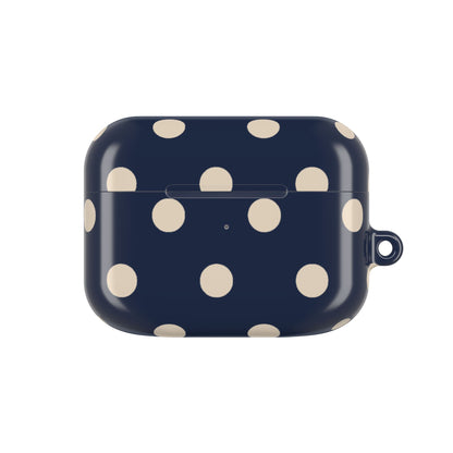Navy blue case with beige polka dots on a white background