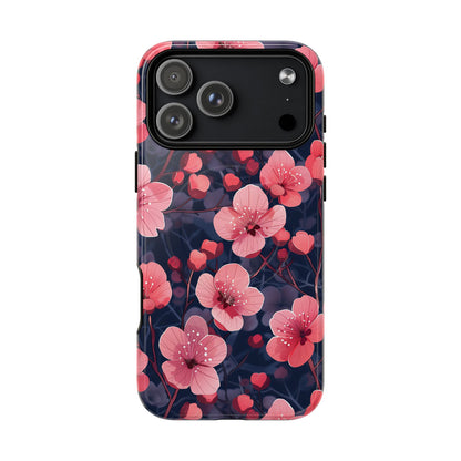 Phone case with pink floral design on a dark background