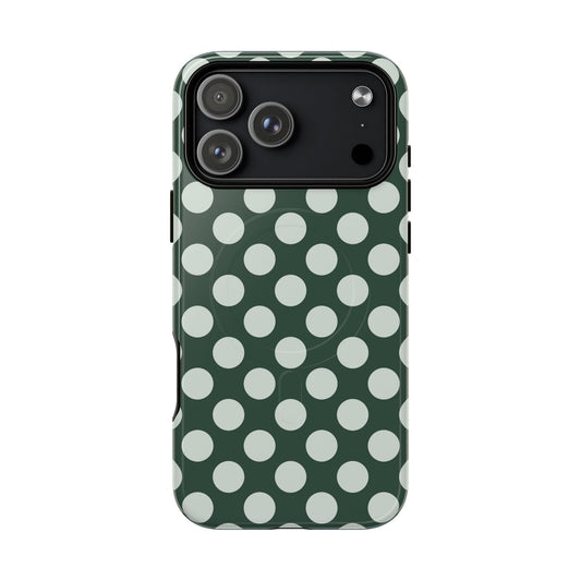 Phone case with green and white polka dot pattern on a white background