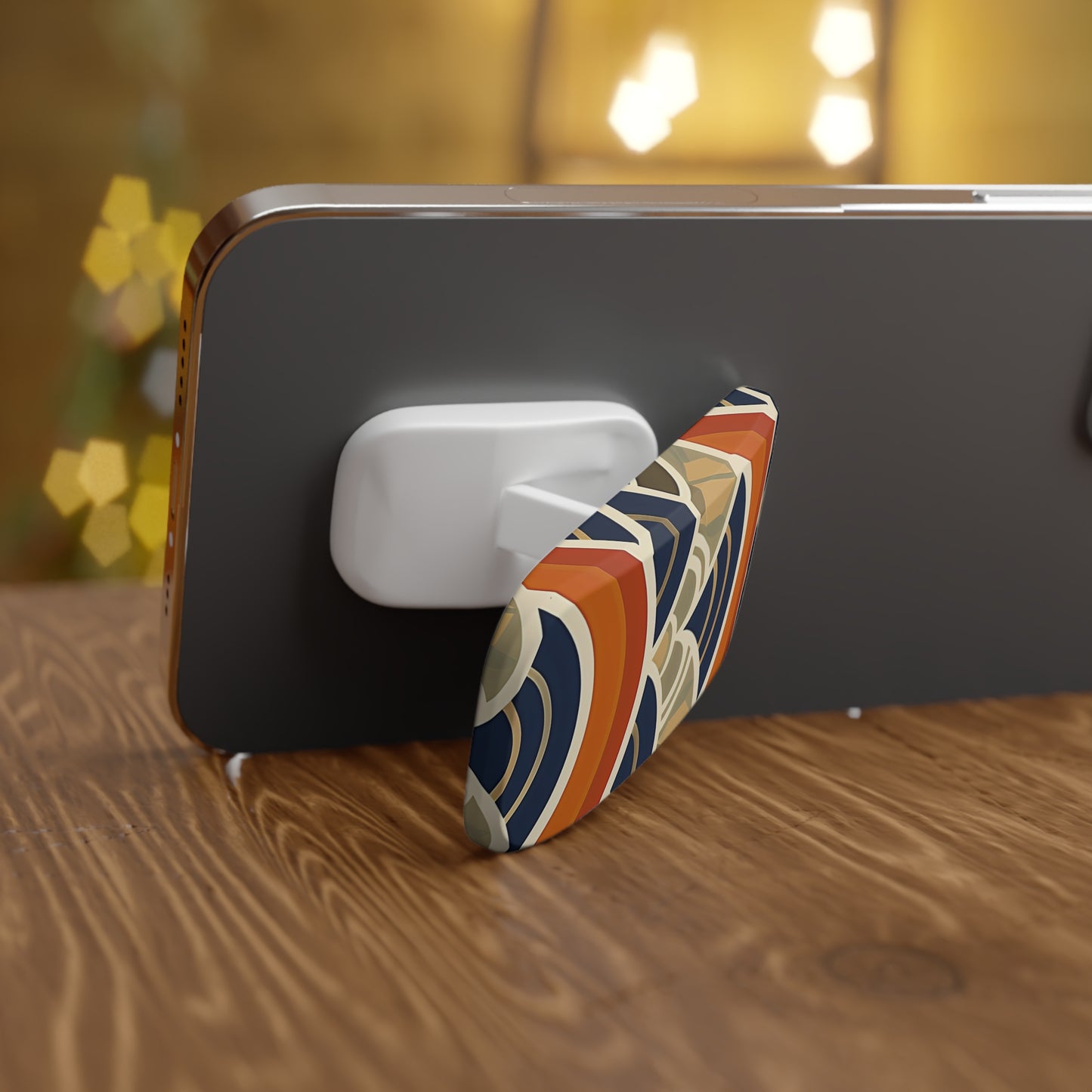 Phone case with a colorful design on a wooden surface