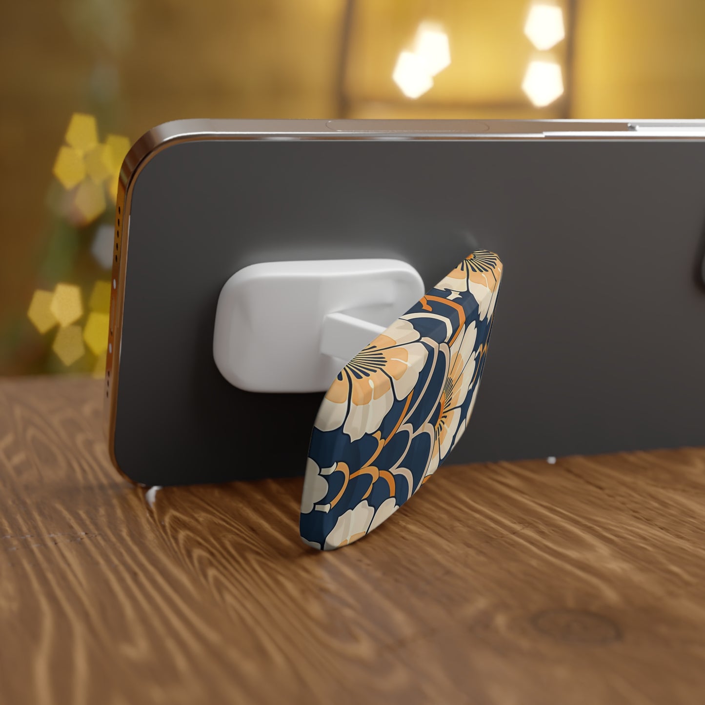 Phone case with floral design on a wooden surface