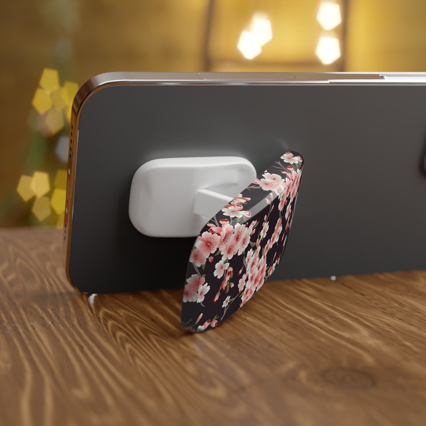Smartphone with floral case and wireless earbuds on a wooden surface | Casenari