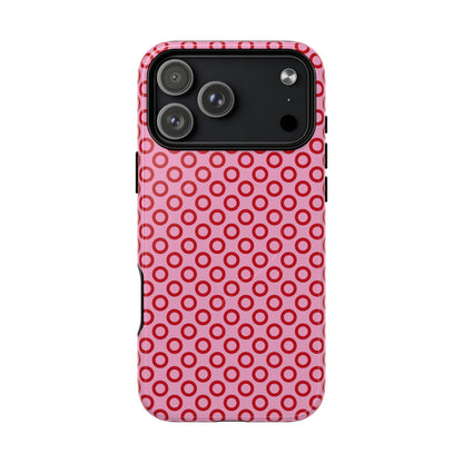 Phone case with pink and red circular pattern on a white background