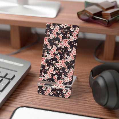 Floral phone stand on a desk with keyboard, mouse, and headphones. | Casenari