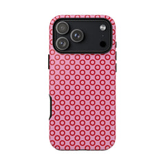 Phone case with red circular pattern on a white background