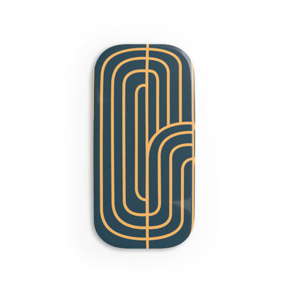 Decorative phone grip with gold geometric pattern on a white background