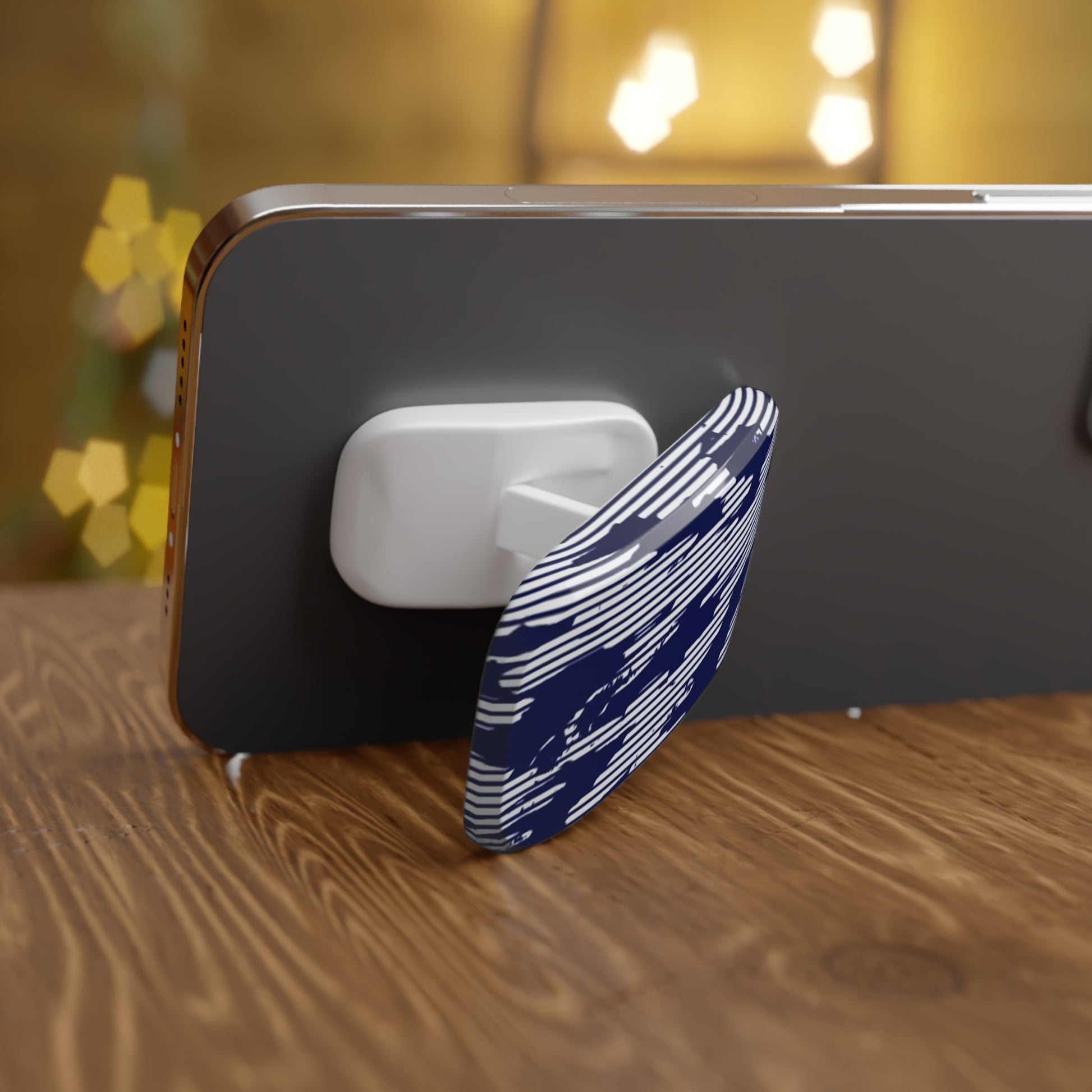 Phone case with a blue and white pattern on a wooden surface