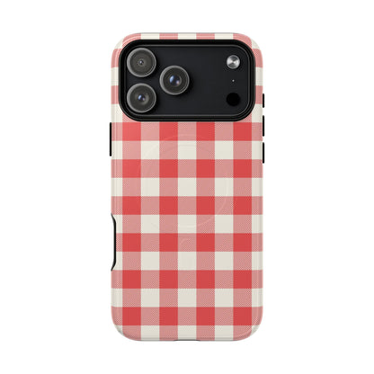 Phone case with red and white checkered pattern on a white background