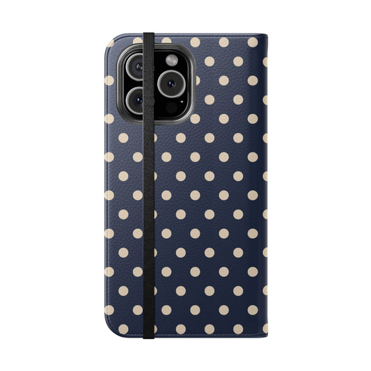 Phone case with a navy blue background and white polka dots on a white background