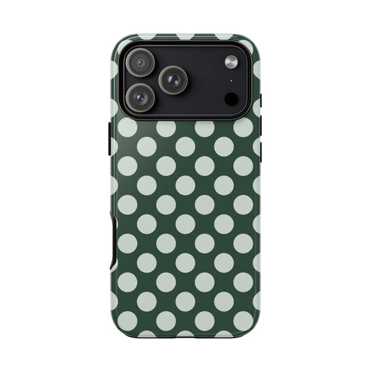 Phone case with green background and white polka dots on a white background