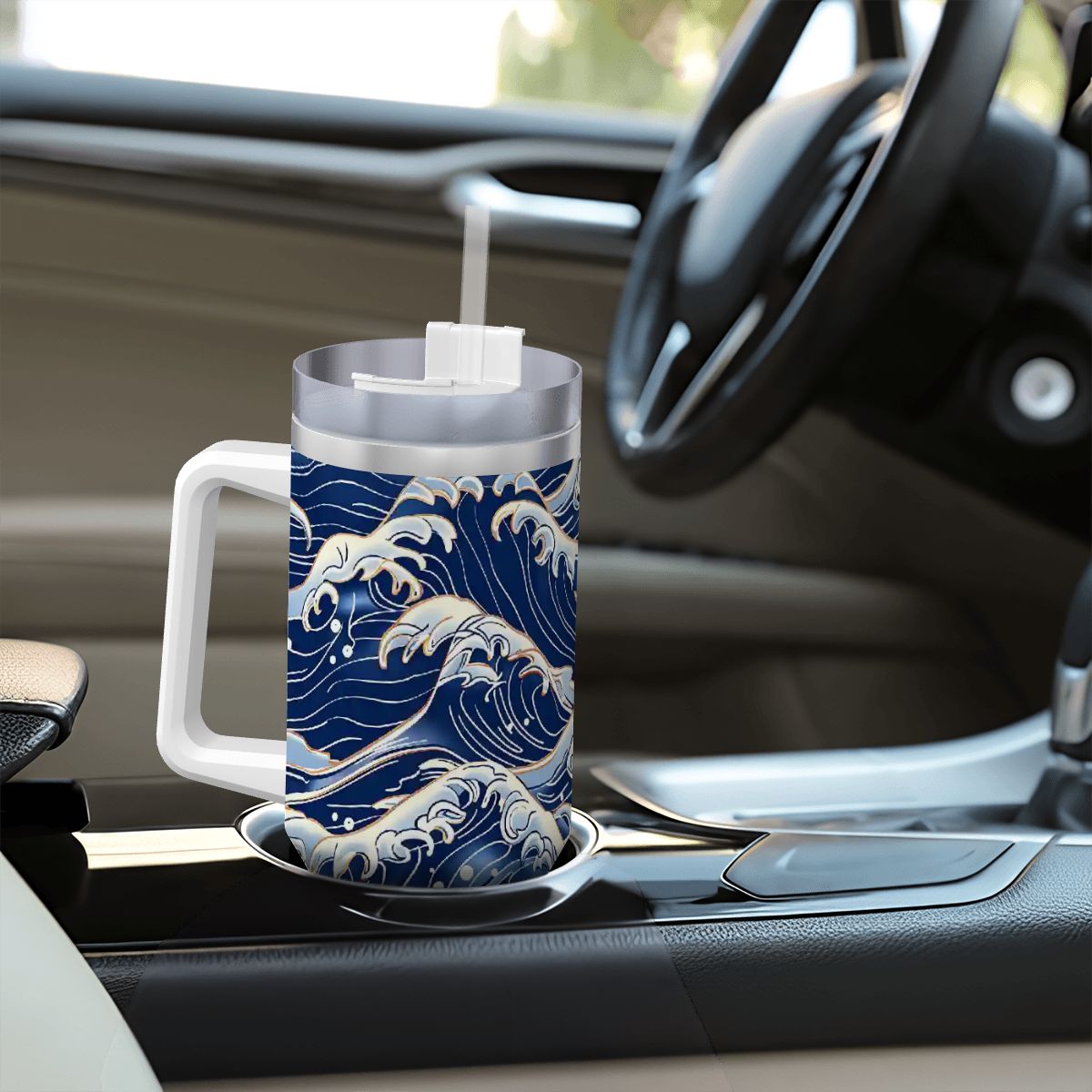 Glass mug with wave design on a car dashboard