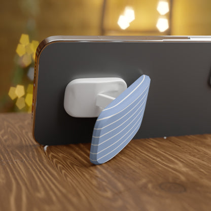 Phone case with a blue stand and white grip on a wooden surface