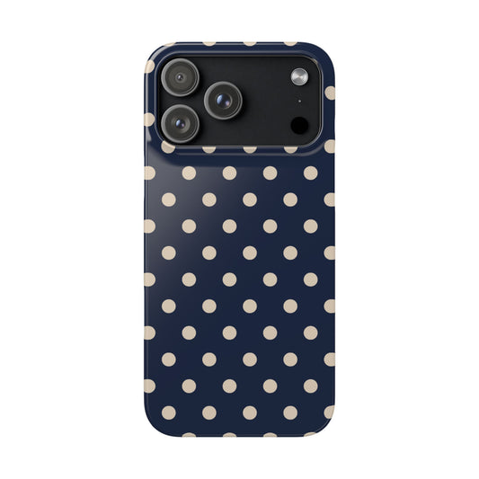 Phone case with navy blue background and white polka dots on a white background