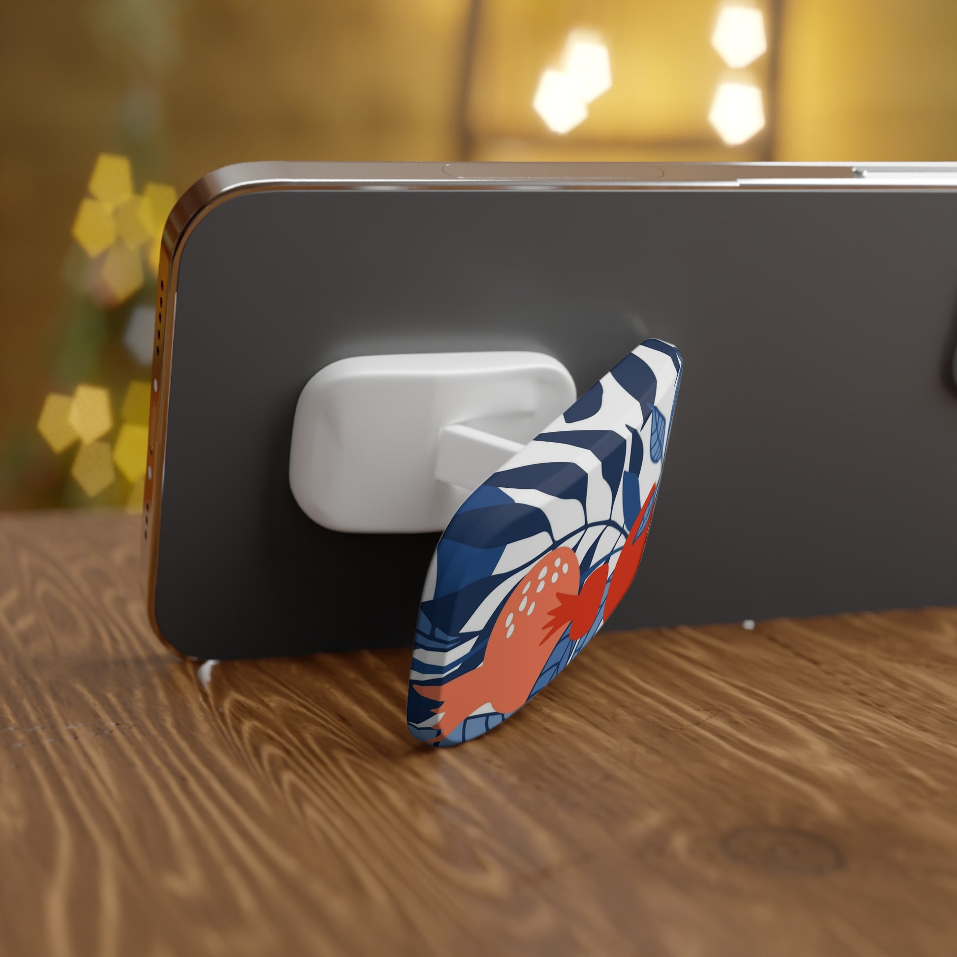 Phone case with a floral design on a wooden surface