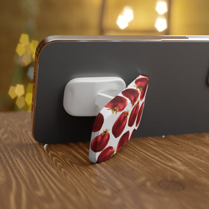 Phone holder with floral design on a wooden surface