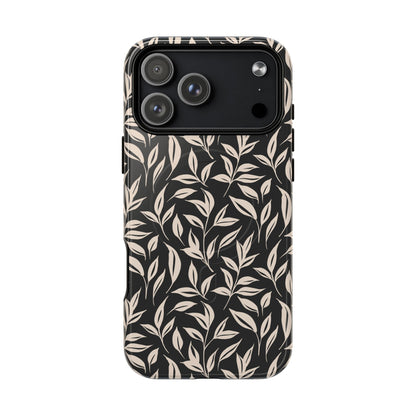 Phone case with leaf pattern on a black background