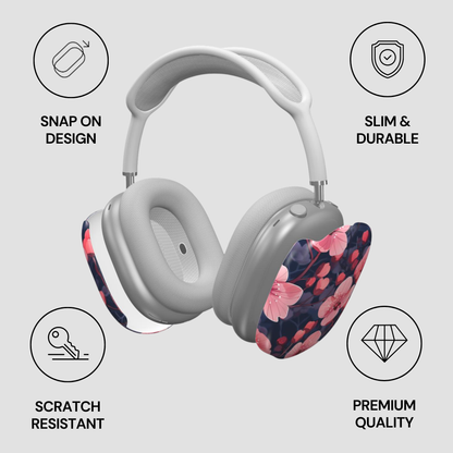 Gray headphones with floral ear covers on a light gray background with feature icons.