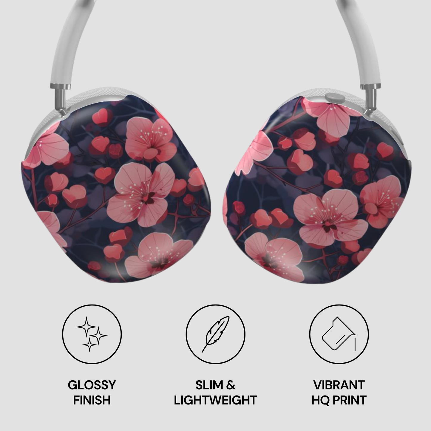 Floral-patterned headphones with glossy finish, slim design, and vibrant print on a light gray background.