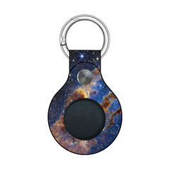 Keychain with space-themed design on a white background