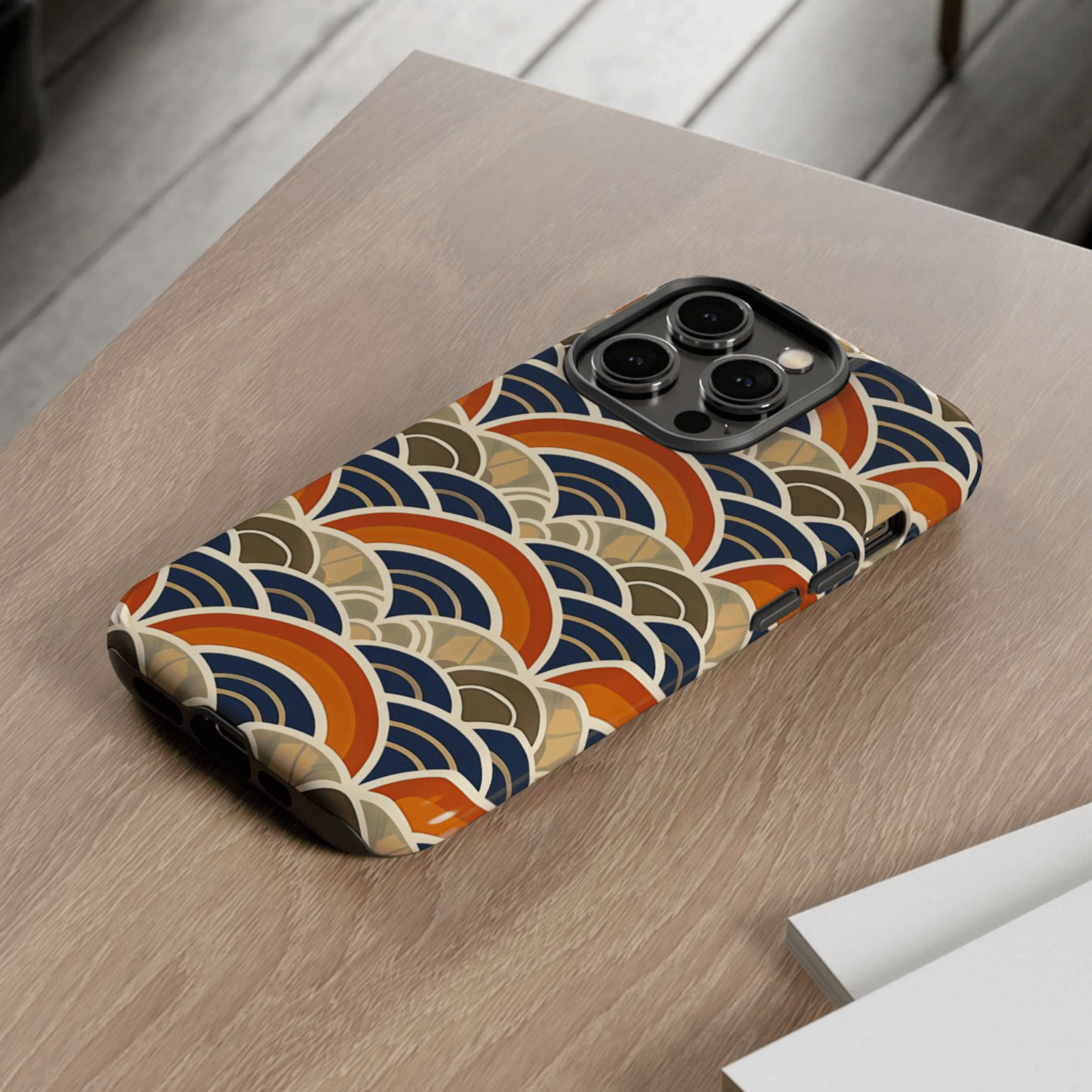 Phone case with a colorful wave pattern on a wooden surface