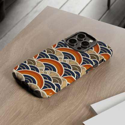 Phone case with a colorful wave pattern on a wooden surface