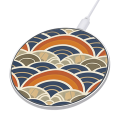 Wireless charging pad with colorful wave pattern on a white background