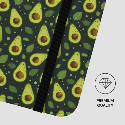 Close-up of a zippered notebook or planner cover featuring a repeating avocado and leaf pattern on a dark background, with a black zipper and a 'PREMIUM QUALITY' diamond icon on the right.