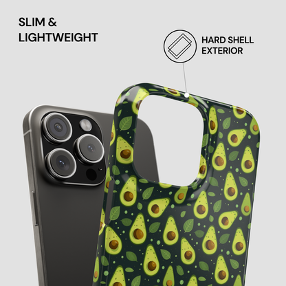 A smartphone case with a repeating avocado print on a dark background, shown next to a phone for scale. Text on the image highlights slim lightweight design and hard shell exterior.