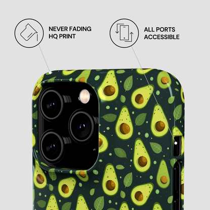 A phone case with a repeating avocado pattern on a dark green background, shown on a smartphone. Two callout graphics at the top read 'NEVER FADING HQ PRINT' and 'ALL PORTS ACCESSIBLE'.