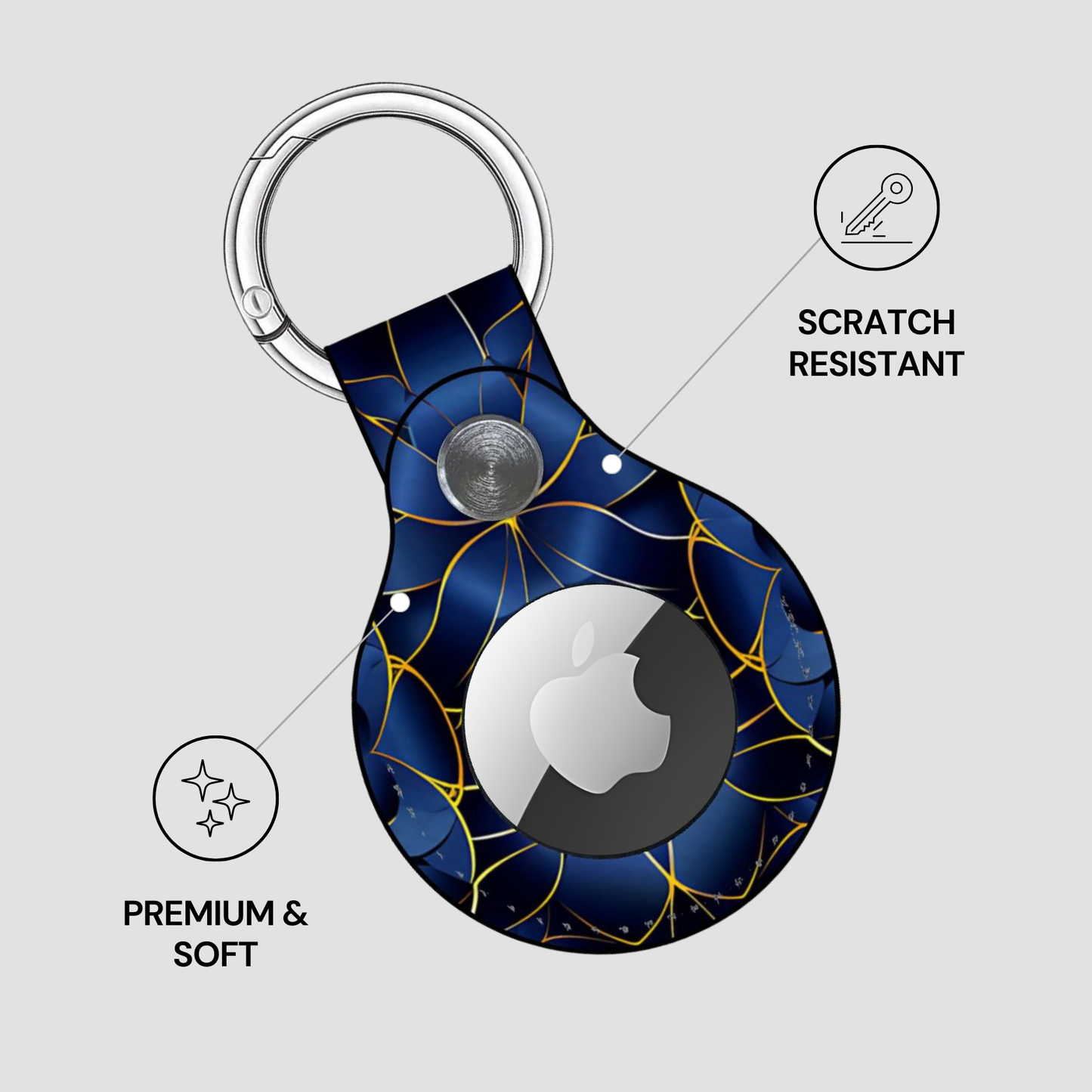 Blue and gold patterned keychain with Apple logo on a gray background