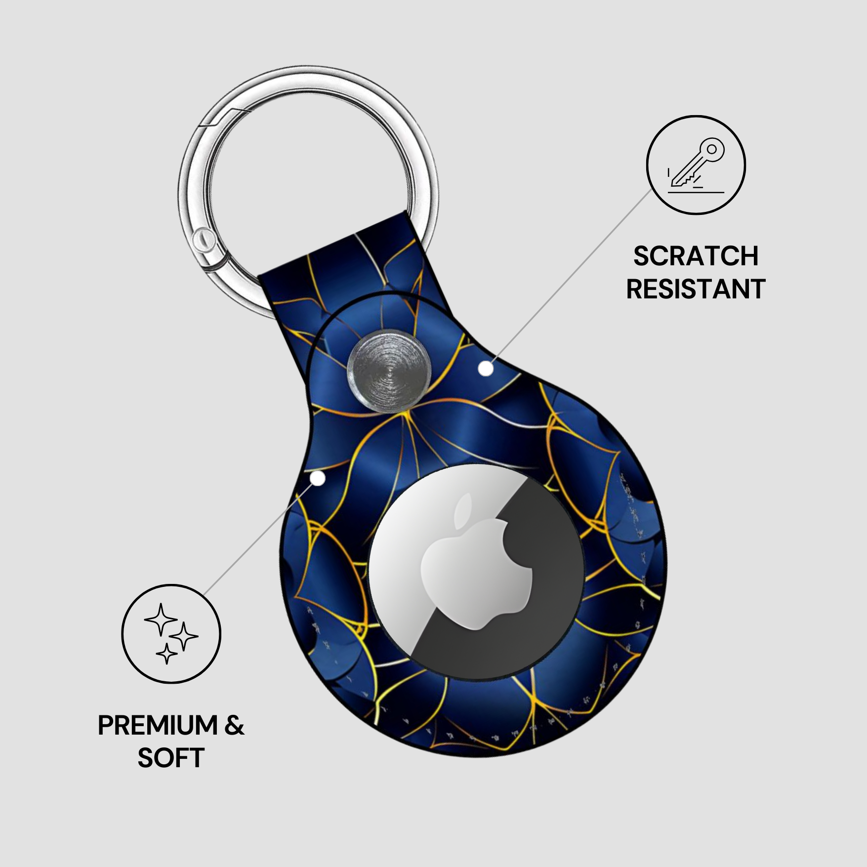 Blue and gold patterned keychain with Apple logo on a gray background