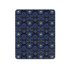 Patterned blue and yellow fabric on a white background
