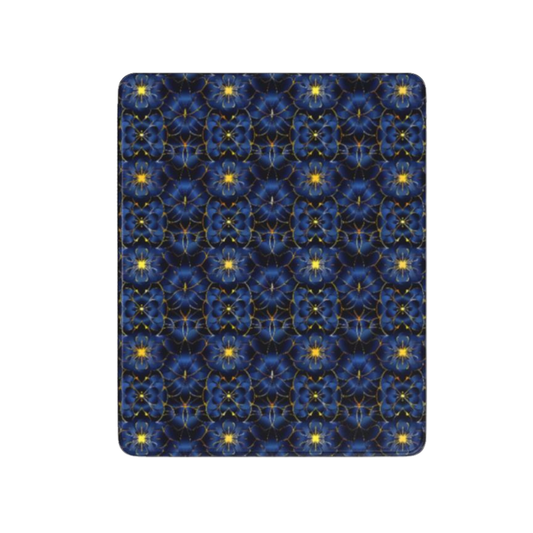 Patterned blue and yellow fabric on a white background