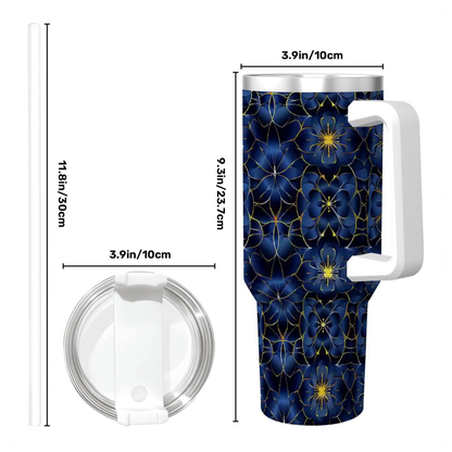 Tumbler with blue floral pattern and measurements on a white background