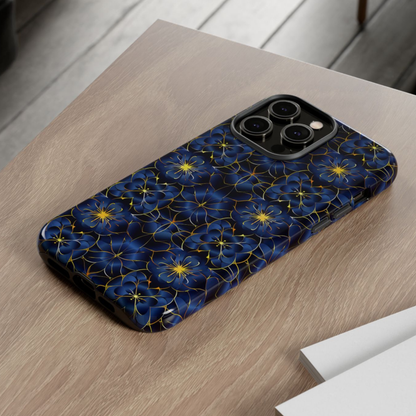 Phone case with blue floral pattern on a wooden surface
