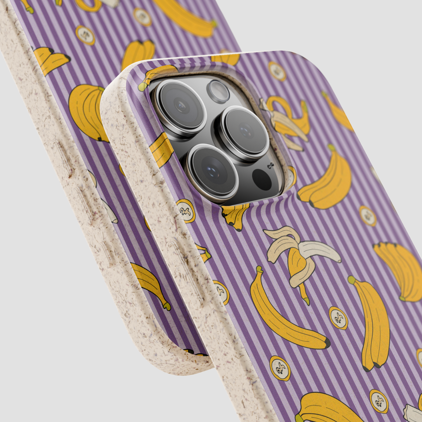 Phone case with banana pattern on a purple background