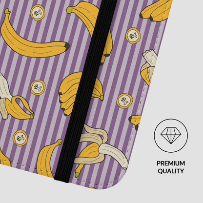 Phone case with banana pattern on purple background