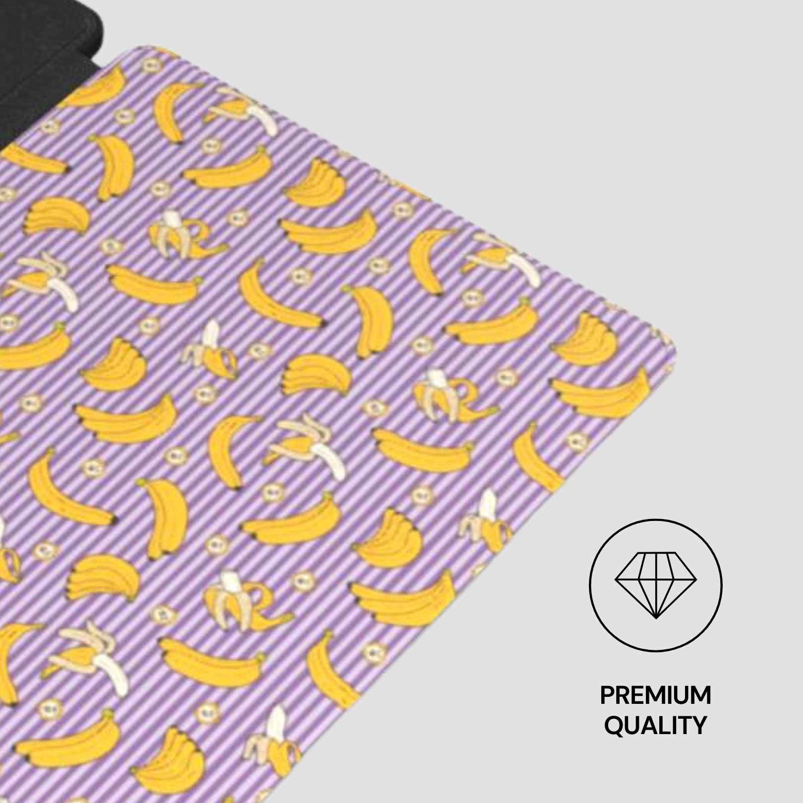 Purple mat with yellow banana pattern and 'Premium Quality' label