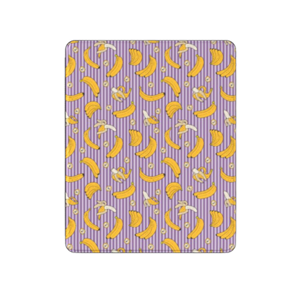 Patterned purple and yellow fabric with banana design on a white background