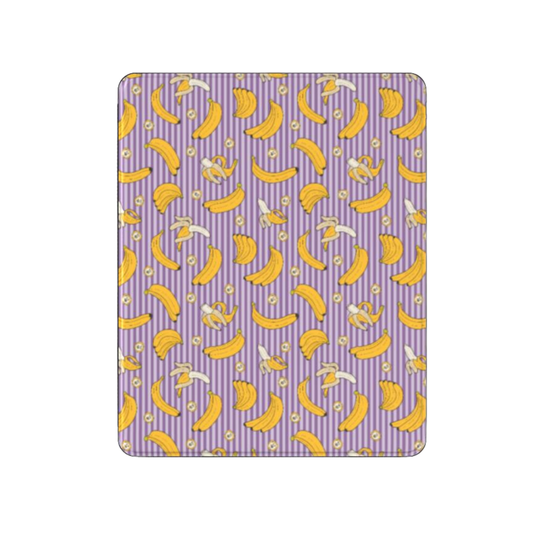 Patterned purple and yellow fabric with banana design on a white background