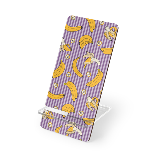 Phone stand with purple and white striped pattern and yellow banana illustrations on a white background