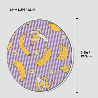 Circular object with banana pattern and measurements on a purple background