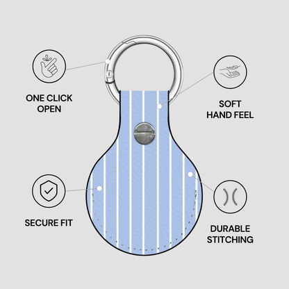 Blue keychain with features highlighted on a gray background