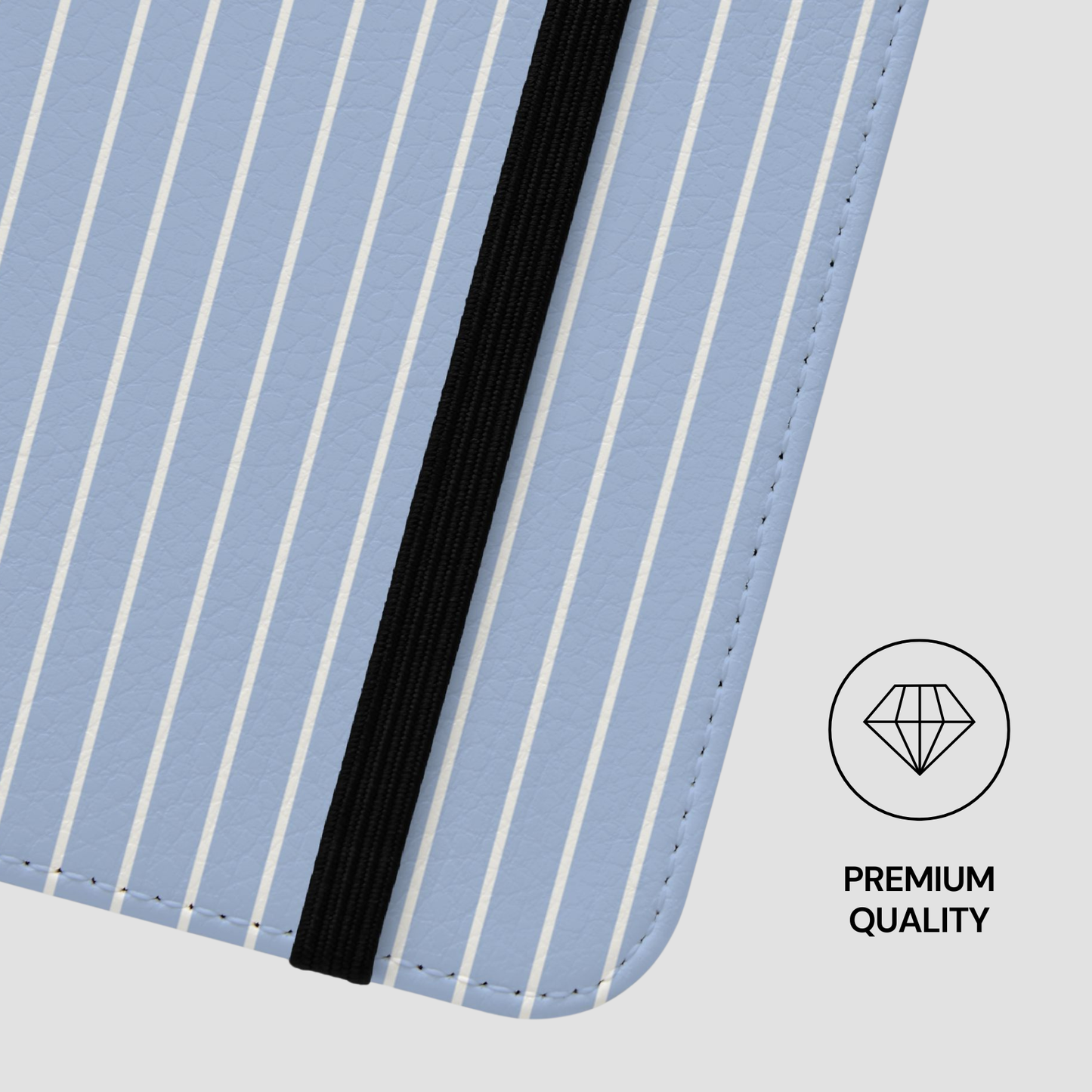 Close-up of a blue and white striped product with a black band, featuring a 'Premium Quality' label.