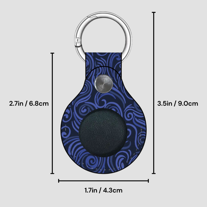 Blue patterned keychain with measurements on a gray background